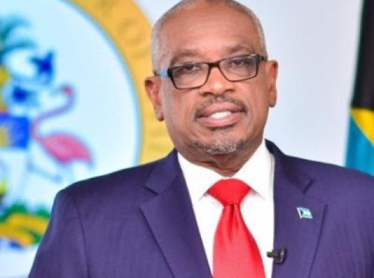 Dr. Hubert Minnis