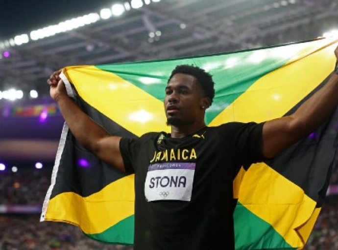 Roje Stona won Jamaica’s first ever Olympic gold medal in the discus.