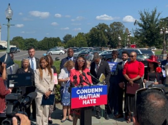 Congresswoman Yvette D. Clarke addressing a news conference condemning attacks on Haitians