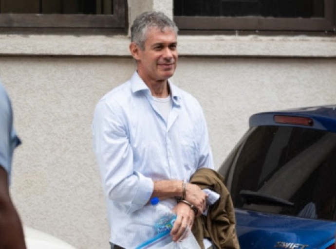 American double murder accused Jonathan Lehrer being escorted back to jail-(Photo courtesy CKJB Photograph)