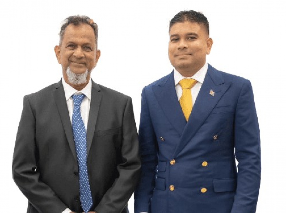 Nazar Mohamed (left) and his son, Azruddin Mohamed (right)
