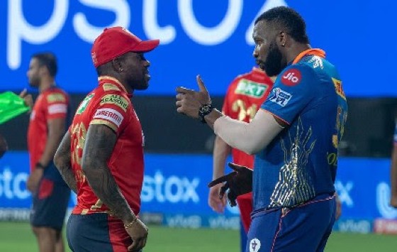 Mumbai Indians’ Kieron Pollard (right) chats with West Indies teammate Fabian Allen of Punjab Kings, following a game in the IPL recently.