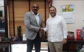 Prime Minister Gaston Browne (left) with Venezuela’s Foreign Minister Yvan Gil (right) following their meeting on Thursday