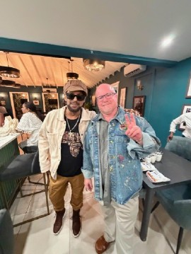 Antiguan singer Causion (left) and Larry Basham at the July launch of his song, One Life to Live, at La Verandah Restaurant and Bar in Plantation, South Florida. Basham is director of photography for the song's video.