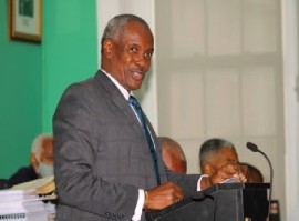 Deputy Prime Minister and Minister of Public Works, Desmond Bannister, speaking in Parliament (BGIS Photo)