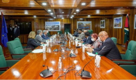 President Dr. Irfaan Ali and his delegation (right) in discussions with representatives of the European Union (DPI Photo)