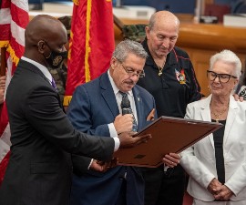 Chairman Diaz reads the proclamation declaring May 18, Georgie Carter-Krell’s Day