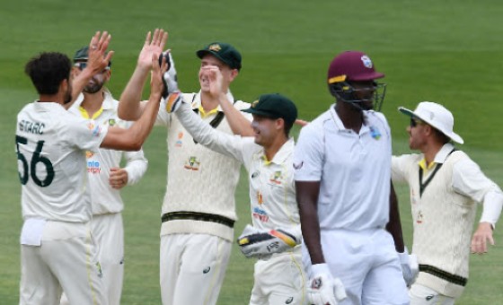 Jason Holder leaves the field after being dismissed by Mitchell Starc on day four of the second Test.