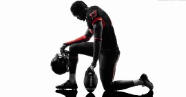 Today, nearly 70 percent of NFL players are African American but there are no African American NFL owners. (Photo: iStockphoto / NNPA)