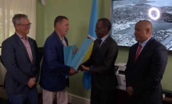 Prime Minister Phillip J Pierre and GPH chairman, Mehmet Kutman, following the signing of the MOU (GIS Photo)