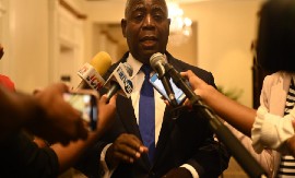 Prime Minister Philip Davis speaking to reporters. (TORRELL GLINTON via The Nassau Guardian)