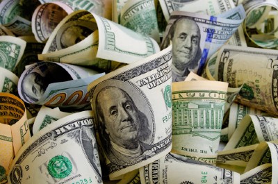 Cash dollars in various denominations on the plane.