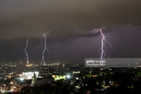 Lightning strikes during an electrical storm over Port-au-Prince on June 25, 2019. (Photo by CHANDAN KHANNA / AFP)        (Photo credit should read CHANDAN KHANNA/AFP via Getty Images)