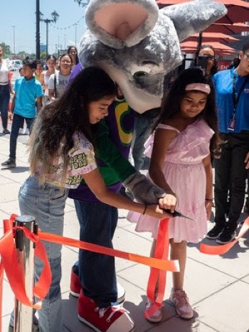 Ribbon cutting for the first Chuck E. Cheese location in Suriname.
