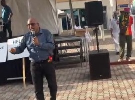 Independent legislator and former foreign affairs minister, Peter David, addressing peaceful protest on Thursday (CMC Photo)