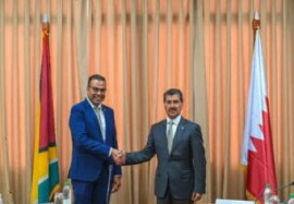 Guyana’s Foreign Secretary, Robert Persaud and Dr Ahmed bin Hassan Al Hammadi, Secretary-General, Ministry of Foreign Affairs of Qatar (DPI Photo)