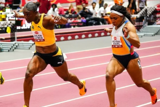 Julien Alfred (left) edges Jacious Spears to win the women’s 60 metres at the Tyson Invitational.