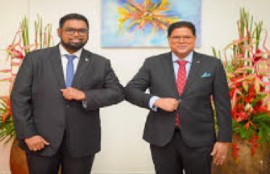 President Irfaan Ali (left) and former Suriname president, Chan Santokhi (File Photo)