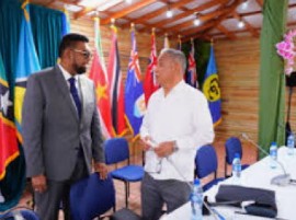 President Irfaan Ali (left) and Prime Minister John Briceno at a CARICOM meeting (File Photo)