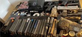 Seized guns and ammunition destined for Haiti displayed by US authorities.