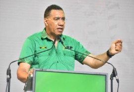Prime Minister and JLP leader, Andrew Holness addressing the party’s 81st annual conference on Sunday