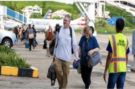 People arrive at Argyle International Airport. (Photo: Facebook/DiscoverSVG)