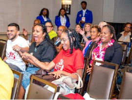 University of the West Indies (UWI) St. Augustine students (l-r) Irshad Mohammed, Angelina Hosein and Sydney Henry react to the exciting news of their win.