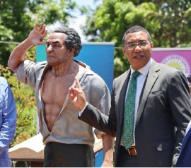 Prime minister Andrew Holness at the unveiling of the statue of Sir Alexander Bustamante at the Hanover Parish Library in Lucea, Hanover. (Photo credit: Twitter @andrewholnessjm)