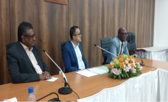 Finance Minister Stanley Raghoebarsing (center) and representatives of the private sector and the Central Bank during Thursday’s news conference (CMC Photo)