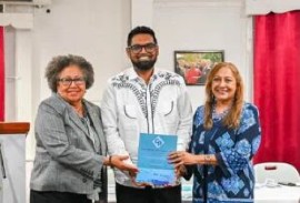 President Dr Mohamed Irfaan Ali along with Caricom Secretary-General, Dr Carla Barnett and author of ‘Caribbean Perspective’ Sandra Ann Baptiste
