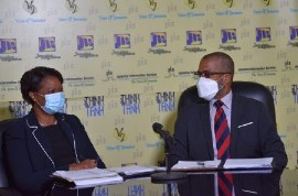 Director of the Consular Department, Ministry of Foreign Affairs and Foreign Trade, Ariel Bowen (left), engages with Undersecretary of the Diaspora, Protocol and Consular Affairs Division, Frantz Hall, during a Think Tank held on Wednesday. (Photo: JIS)