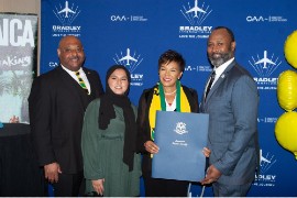 Jamaica’s Ambassador to the United States Audrey Marks receives the Governor’s proclamation making December 15 Jamaica Day in the State of Connecticut. Presenting the proclamation on behalf of Governor Lamont, is State Representative Bobby Gibson. At left is Mr. Andrew Lawrence, head of the Caribbean Trade Council, and State Representative Marym Khan. The presentation was made at a function to launch Spirit Airlines new, nonstop service to Montego Bay, Jamaica from the Bradley International Airport (BDL) in Windsor Locks just outside of Hartford Connecticut, on Thursday December 15, 2022.