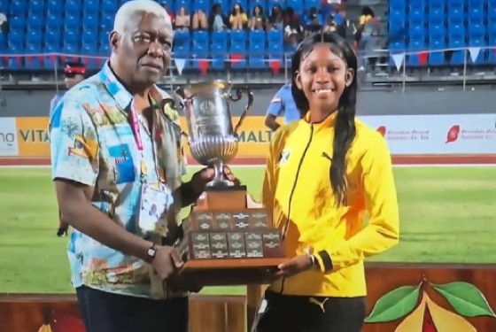 Shanoya Douglas (right) poses with the Austin Sealy Award