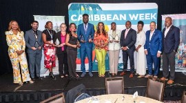The Caribbean Tourism Organization (CTO) and its member countries, including the Bermuda Tourism Authority, proudly celebrated the contributions of media professionals during Caribbean Week in New York last week. At left is CTO Secretary-General Dona Regis-Prosper; fourth from right is Bermuda’s Minister of Tourism, Owen Darrell.