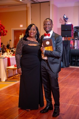 Carol Hylton, founder of Smiley’s Voice Foundation and Dr. Kevin Wade, senior neurosurgeon at the University Hospital of the West Indies' stroke unit in Jamaica, at the 2024 Black, Red & White Foundation Gala at Doubletree By Hilton hotel in Fort Lauderdale.