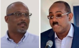 Former LIAT pilot, Neil Cave (Left) and Prime Minister Gaston Browne (File Photo)