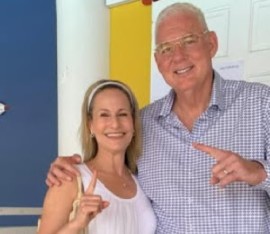 Allen Chastanet and his wife show off their voting finger after casting their ballot in the December 1 general election.