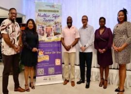 (L-R) Colin James, CEO of the Antigua and Barbuda Tourism Authority, Dr Lisa Indar, Ad Interim Executive Director, CARPHA and Head of THP,St. Clair Soleyn Director of Policy and Planning, Ministry of Tourism, Civil Aviation, Transportation and Investment, the Minister of Tourism, Civil Aviation, Transportation, and Investment, Henry Charles ‘Max’ Fernandez, . Permanent Secretary, Ministry of Health, Wellness and the Environment Gregg-Paige,and Dr. Kamaria De Castro, Acting Chief Medical Officer.