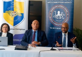 Executive Director of the Integrity Commission, Craig Beresford (right) addresses the a press conference during the 12th Annual Commonwealth Caribbean Association of Integrity Commissions and Anti-Corruption Bodies (CCAICAB) Conference. Also pictured are (from left) CCAICAB Chairperson Lady Anande Trotman-Joseph and Director-General of the Major Organised Crime and Anti-Corruption Agency, Colonel Desmond Edwards. (Photo credit: JIS)