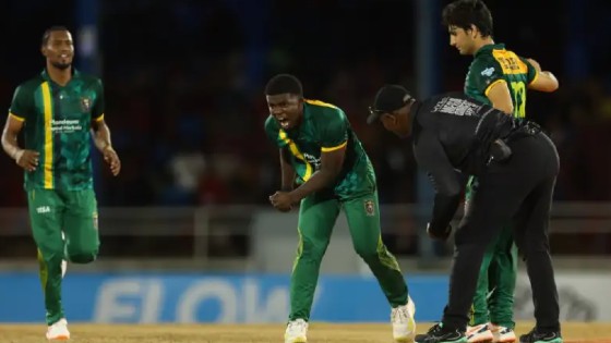 Vitel Lawes (centre) celebrates one of his three wickets against the Trinbago Knight Riders.