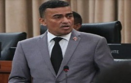 Finance Minister Davendranath Tancoo tabling the Finance Bill in Parliament on Friday (CMC Photo)