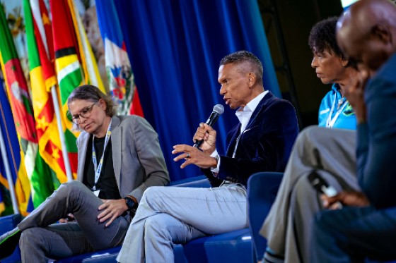 CWI CEO Chris Dehring (c) addressing the State of the Tourism Industry Conference (SOTIC) in Barbados.