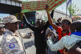 Demonstrators marched for increased minimum wage.