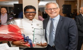 Justice Dena Douglas accepts the award from Kings County Criminal Bar Association (KCCBA) President Michael Sheinberg (CMC Photo)