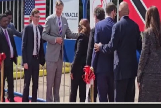 United States Deputy Secretary of State, Christopher Landau (in grey suit) at the ribbon cutting ceremony for the the Ibis Steel Company at Point Lisas in central Trinidad, on the site of the former ArcelorMittal plant, (CMC Photo)
