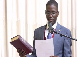 Prime Minister Dickon Mitchell taking the Oath of Office (CMC Photo)