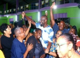 A jubilant DLP leader. Dr. Ronnie Yearwood (center) celebrates with party supporters on his re-election victory (Photo courtesy BarbadosToday)