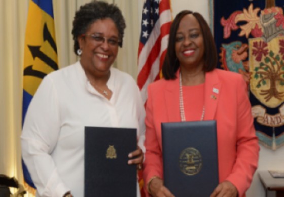 Prime Minister Mia Mottley (left) and EXIM Bank chairman and president, Reta Jo Lewis after signing MOU on Monday