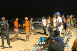 Patrons at the closing ceremony of the Anguilla Summer Festival, a police officer on duty (Photo courtesy RAPF)