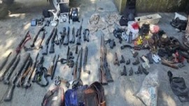 Guns and equipment seized during raid on gang leader’s stronghold in Haiti